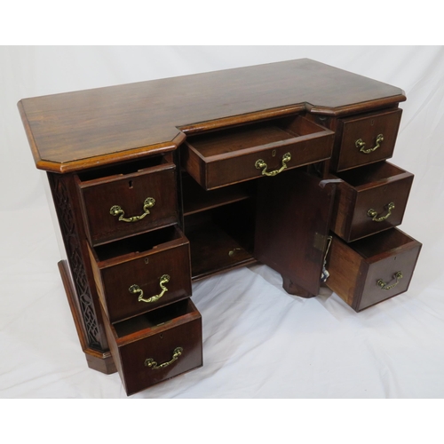 35 - Georgian mahogany front desk with side and one frieze drawer, drop handles, central press, on bracke... 