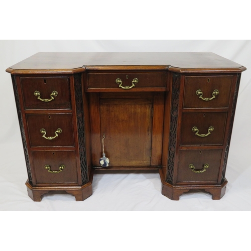 35 - Georgian mahogany front desk with side and one frieze drawer, drop handles, central press, on bracke... 