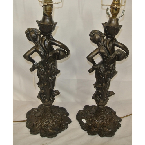 37 - Pair of ornate bronzed electric table lamps with lady figures, foliate and leaf decorated bases