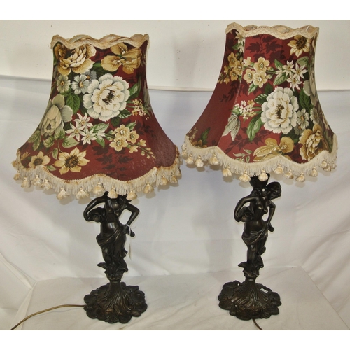 37 - Pair of ornate bronzed electric table lamps with lady figures, foliate and leaf decorated bases