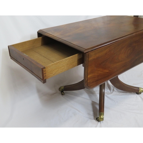 50 - Georgian mahogany centre or library table with drop leaves, rounded borders, pull-out supports, on b... 