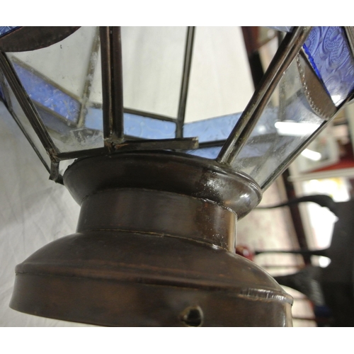 54 - Victorian style metal framed hexagonal hanging lightshade with tinted foliate decorated glass panels