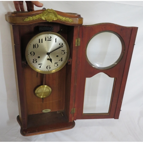 61 - Edwardian inlaid and crossbanded walnut wall clock with foliate ormolu mounts, round brass framed di... 