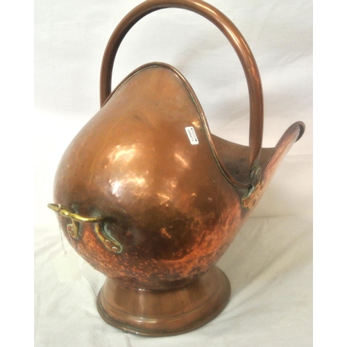 91 - Georgian copper helmet shaped coal scuttle with shaped handle and round base