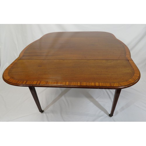 100 - Edwardian Sheraton inlaid and crossbanded mahogany  dropleaf table with bowed ends, bowed drawers wi... 