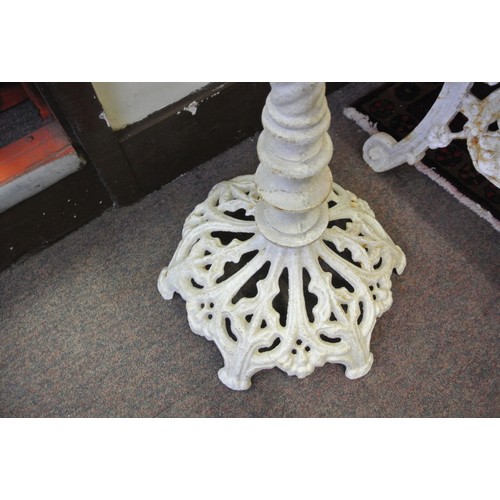 142 - Ornate cast iron birdbath with shell shaped bowl, bird mounts and pierced base