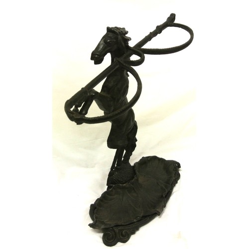 143 - Cast iron umbrella and stick stand with horse shaped column and scroll decorated base