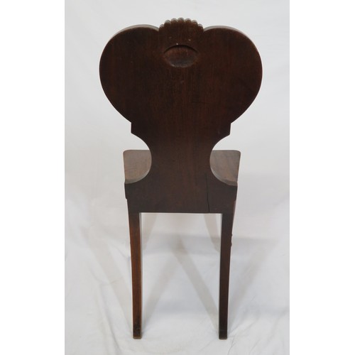 276 - Victorian mahogany hall chair with shield shaped scroll decorated back, on turned tapering legs