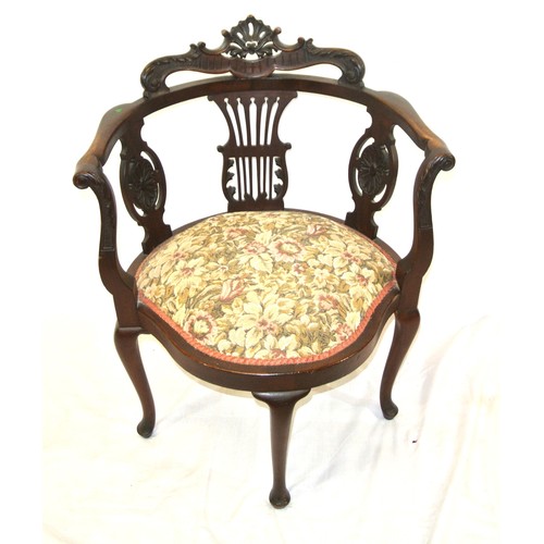 279 - Victorian mahogany tub armchair with scroll decorated pediment, shaped arms, pierced splats, serpent... 