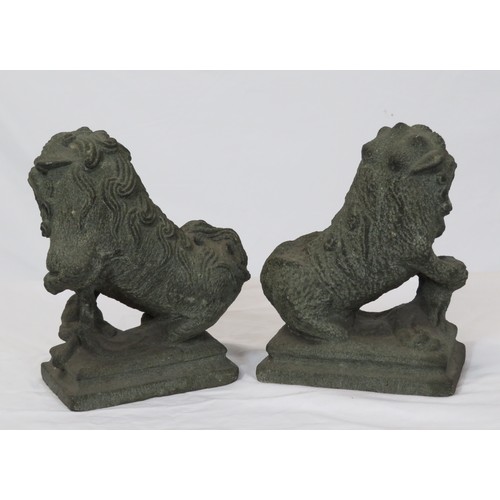 67 - Pair of carved stone Qing Dynasty style foo dogs on stepped bases