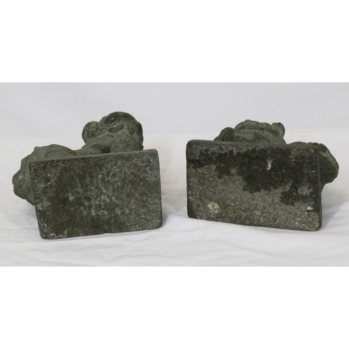 67 - Pair of carved stone Qing Dynasty style foo dogs on stepped bases