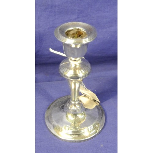 119 - Small Birmingham silver candlestick with reeded decoration and round base 155g 12.5cm