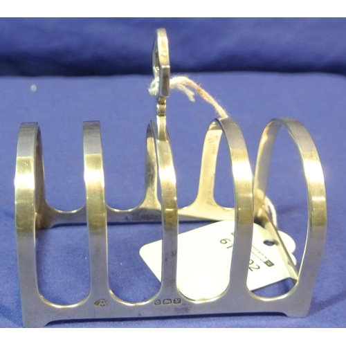 110 - Birmingham silver four section small toast rack of domed form