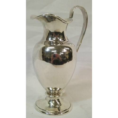 141 - Sheffield silver baluster shaped ewer with reeded shaped handle on circular raised base, 225g