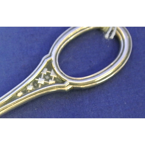 148 - Birmingham silver grape scissors with foliate decoration.L 16cm