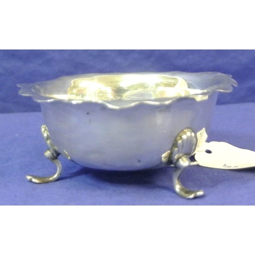 152 - Small Birmingham silver round bowl with wavy rim, on three cast feet. H4cm x D 9cm