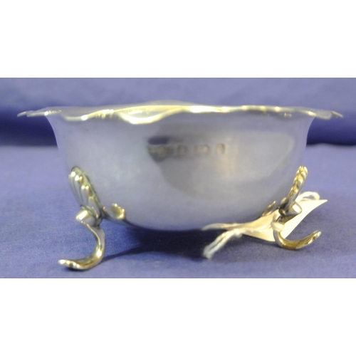 152 - Small Birmingham silver round bowl with wavy rim, on three cast feet. H4cm x D 9cm