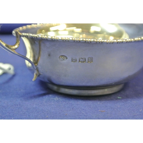 155 - George V Birmingham silver cream or sauceboat with gadroon rim and scroll handle, 51g  H 3cm x 11 X8... 