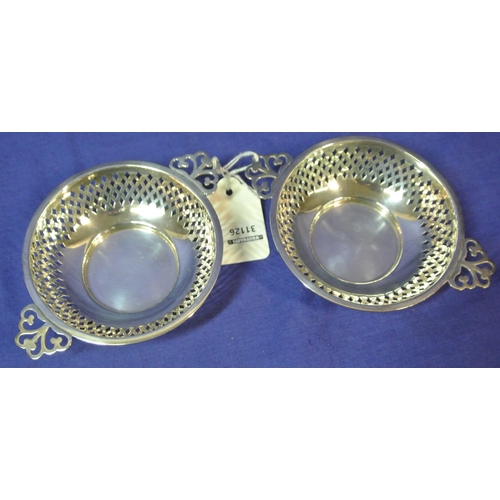 181 - Pair of Birmingham silver pierced bon bon dishes with shaped handles D 9cm  Total 87g