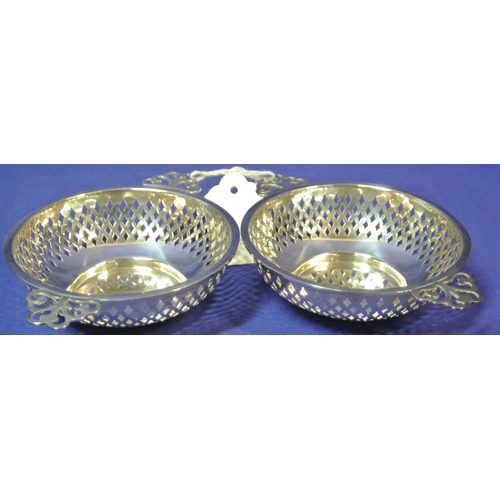 181 - Pair of Birmingham silver pierced bon bon dishes with shaped handles D 9cm  Total 87g