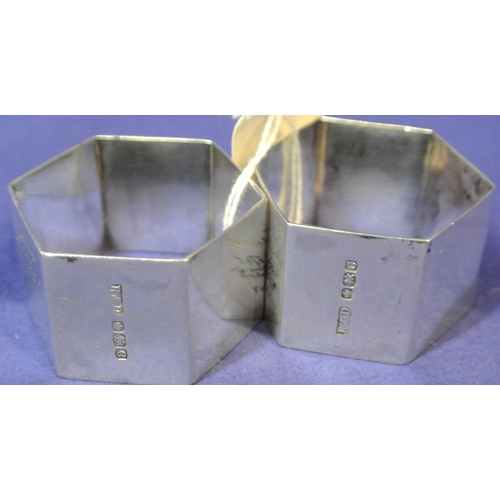 184 - Pair of Sheffield silver hexagonal shaped napkin rings.    4 x3 cm    71g