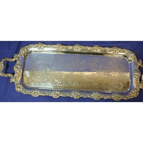 21 - Large silverplated serving tray with ornate grapevine and scroll decoration and a similar half size ... 