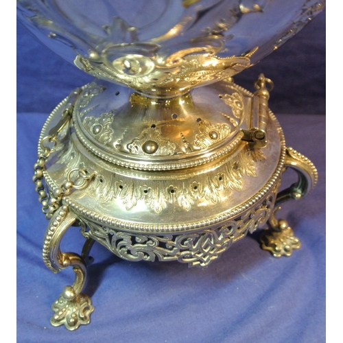 22 - Ornate silver plated kettle on stand decorated and chased with fruit and foliage, hinged, on round b... 