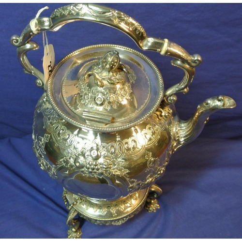 22 - Ornate silver plated kettle on stand decorated and chased with fruit and foliage, hinged, on round b... 