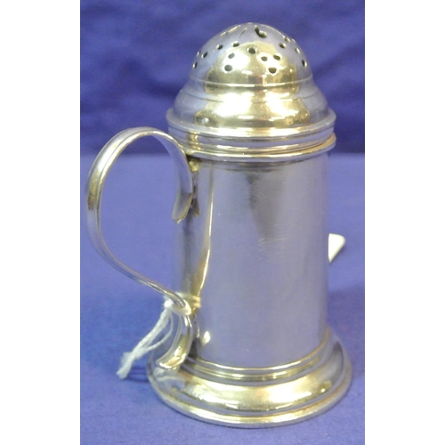 253 - George II silver pepper pot of round form with shaped handle and stepped base, by Emmanuel Walker, D... 