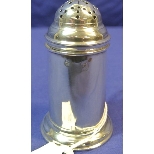 253 - George II silver pepper pot of round form with shaped handle and stepped base, by Emmanuel Walker, D... 