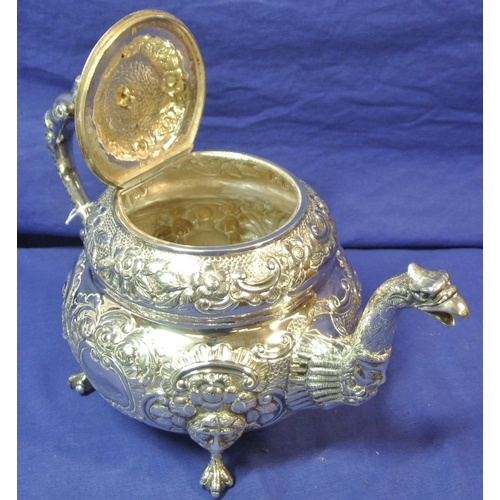 261 - Irish silver George III teapot of double circular form profusely chased and decorated with scrolls a... 