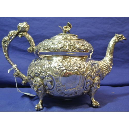 261 - Irish silver George III teapot of double circular form profusely chased and decorated with scrolls a... 