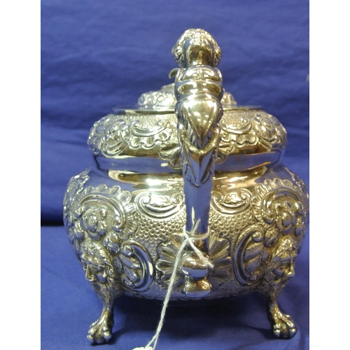 261 - Irish silver George III teapot of double circular form profusely chased and decorated with scrolls a... 