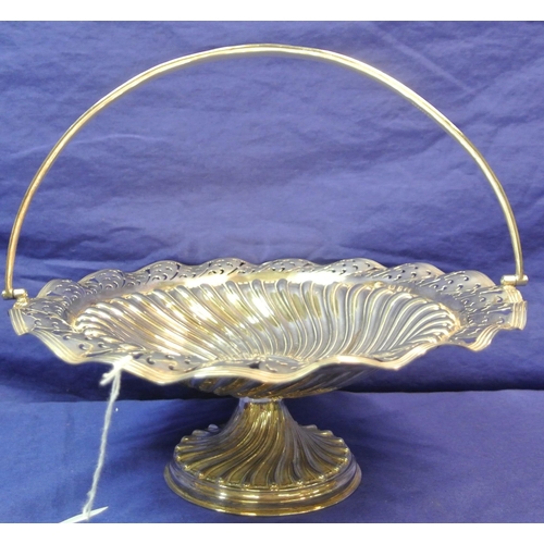 29 - Silverplated cake stand with pierced and foliate decoration and swing handle