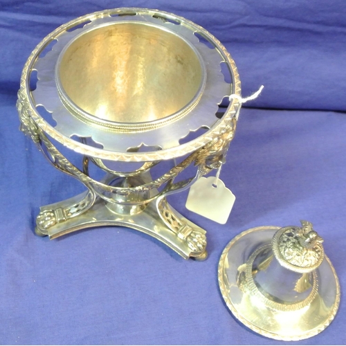 34 - Ornate silverplated mantel jar with bird mount, foliate and figured decoration, on shaped base