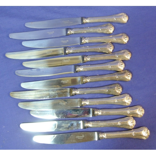 43 - Set of twelve Christofle French silver 'Port Royale' dinner knives with shaped handles