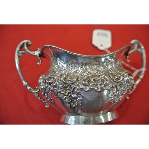 98 - Ornate Sheffield silver oval sugar bowl with wavy rim, ornate scroll and foliate decoration, shaped ... 