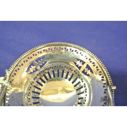 108 - Birmingham silver sweet basket with beaded and pierced decoration on round base.  H 11/5CM D 10cm