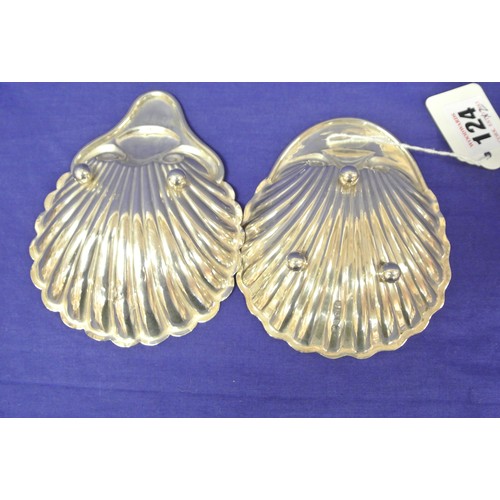 124 - One Chester & one Birmingham silver shell shaped bon bon dishes with scroll decoration.  D 10cm