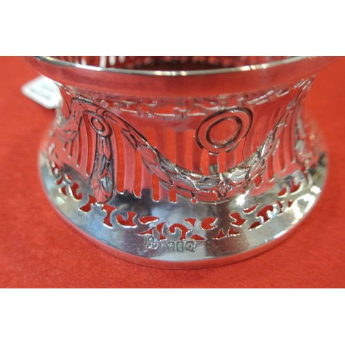 292 - Small Irish silver dish ring with ribbon and foliate decoration Dublin dated 1929.  h6cm 11 X 9.5cm ... 