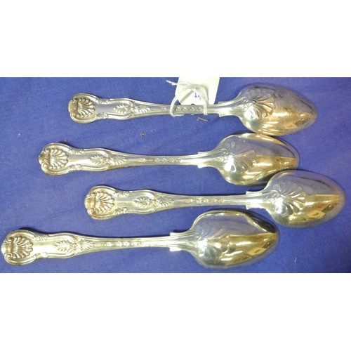 144 - Set of four London silver Kings pattern dessert spoons with shaped handles L 17.5cm