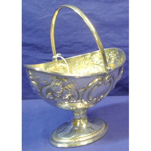 260 - Irish silver George III oval sugar bowl with repousse, scroll and foliate decoration, swing handle, ... 