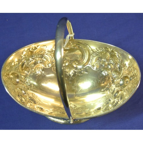 260 - Irish silver George III oval sugar bowl with repousse, scroll and foliate decoration, swing handle, ... 