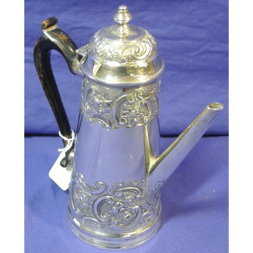 143 - London silver coffee pot of round tapering form with rococo scroll and foliate decoration, lid with ... 