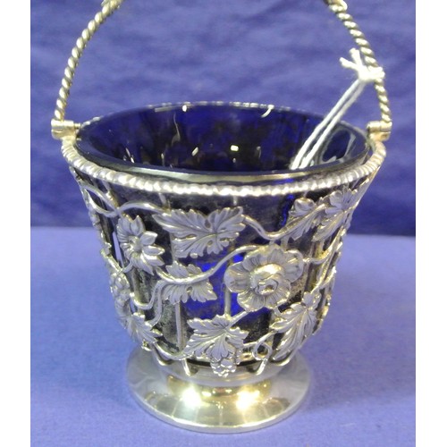 170 - Sheffield silver small basket with swing handle, blue glass liner, ornate wire-work foliate and grap... 