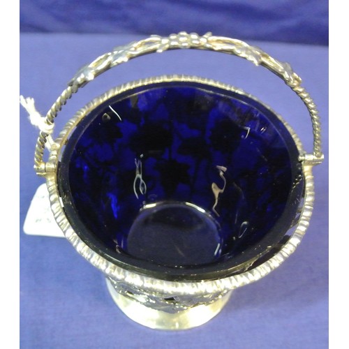 170 - Sheffield silver small basket with swing handle, blue glass liner, ornate wire-work foliate and grap... 