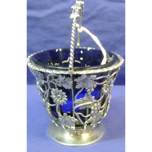 170 - Sheffield silver small basket with swing handle, blue glass liner, ornate wire-work foliate and grap... 