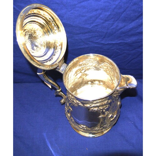 59 - Victorian Sheffield silver ewer embossed with cattle and sheep in a meadow, with shaped handle, lid ... 