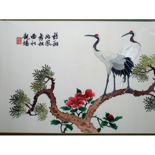 394 - Oriental school 'Colourful montage of birds' silkwork 42x75cm signed