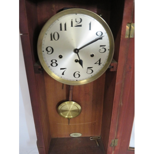 27 - Edwardian inlaid and crossbanded walnut wall clock with foliate ormolu mounts, round brass framed di... 